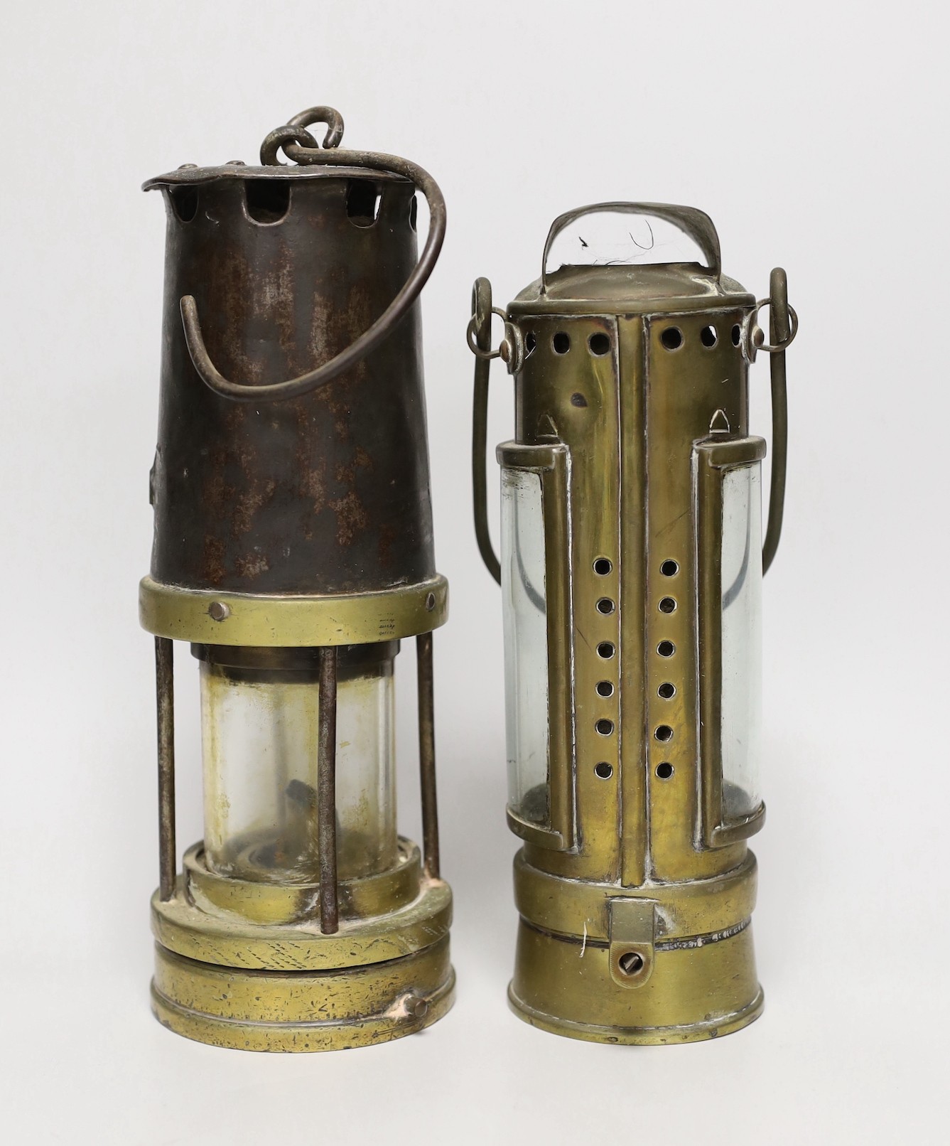 A Patterson & Co. miners lamp and another